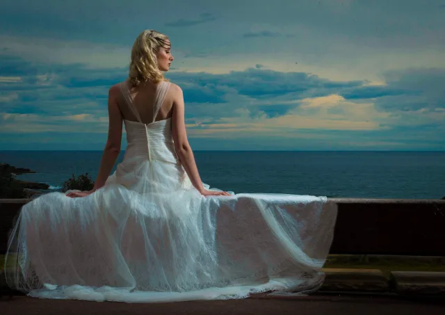 Bride photographed in a professional wedding portrait at Little Bay, Sydney.